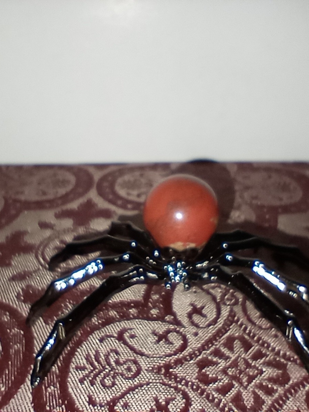 Decorative Black Metal Spider Figurine with Red Jasper Crystal Body